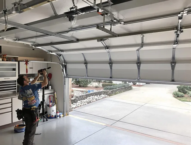 Garage door track repair service by Newark Garage Door Repair in Newark